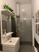 Kúpeľňa v ubytovaní City Corso Apartman