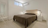 Postel nebo postele na pokoji v ubytování Apartamentos Moraira