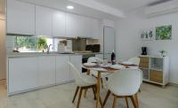 Kuchyň nebo kuchyňský kout v ubytování Apartamentos Moraira