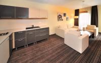Televízia a/alebo spoločenská miestnosť v ubytovaní Via Jasna Wellness Apartments