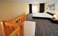 Posteľ alebo postele v izbe v ubytovaní Via Jasna Wellness Apartments