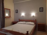 Posteľ alebo postele v izbe v ubytovaní Athanasios Tsoumas Apartments