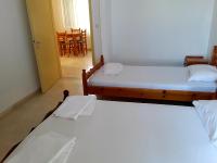 Posteľ alebo postele v izbe v ubytovaní Athanasios Tsoumas Apartments