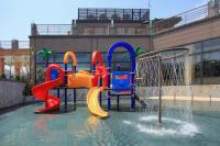 a water park with a playground with a water slide at Jin Yong Quan Spa Hotspring Resort in Wanli District