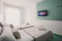 Postel nebo postele na pokoji v ubytování SubUp Hostel