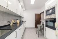 Kuchyň nebo kuchyňský kout v ubytování Puerto - Local Rentss