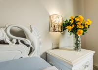 A bed or beds in a room at Alghero Roof Garden