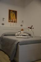 Posteľ alebo postele v izbe v ubytovaní B&B La Casa Sulla Roccia