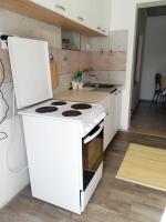 Kuchyňa alebo kuchynka v ubytovaní Hit apartment