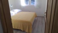 Posteľ alebo postele v izbe v ubytovaní Apartment Zaklopatica