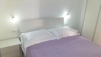 Posteľ alebo postele v izbe v ubytovaní Apartment Zaklopatica
