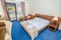 Postel nebo postele na pokoji v ubytování Family Hotel Pagus - All Inclusive