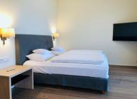 A bed or beds in a room at Linde Villas