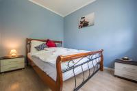 Posteľ alebo postele v izbe v ubytovaní Apartament Brzozowy Zakątek - 5D Apartamenty