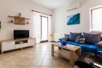 Televízia a/alebo spoločenská miestnosť v ubytovaní Apartments Belavic by El-Pi Tours
