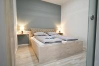 Posteľ alebo postele v izbe v ubytovaní Moment Apartments