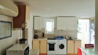Kuchyňa alebo kuchynka v ubytovaní Apartman Paro