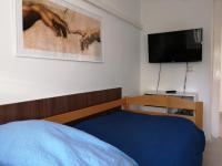Posteľ alebo postele v izbe v ubytovaní Apartman Paro