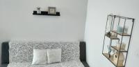 Postel nebo postele na pokoji v ubytování Jovich Apartments 3
