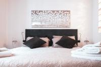 Łóżko lub łóżka w pokoju w obiekcie veronaeasyapartments