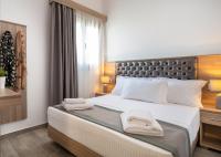 Posteľ alebo postele v izbe v ubytovaní Jolandas Suites