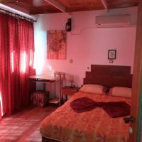 A bed or beds in a room at VLASSIS APTS -ΜΕΛΙΔΟΝΙ-ΔΙΑΜΕΡΙΣΜΑ ΒΑΣΙΛΙΚΗ
