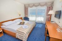 Postel nebo postele na pokoji v ubytování Family Hotel Pagus - All Inclusive