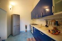 Kuchnia lub aneks kuchenny w obiekcie Villa Azzurra nel centro di Costa Rei