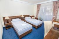 Postel nebo postele na pokoji v ubytování Family Hotel Pagus - All Inclusive
