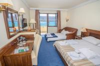 Postel nebo postele na pokoji v ubytování Family Hotel Pagus - All Inclusive