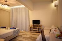 TV a/nebo společenská místnost v ubytování Myrtis Spa Hotel