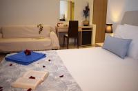 Postel nebo postele na pokoji v ubytování Myrtis Spa Hotel