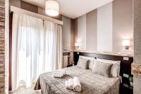 Posteľ alebo postele v izbe v ubytovaní Santamaria Inn
