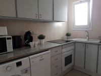 Kuchyň nebo kuchyňský kout v ubytování Lets Holidays terrace apartment 2