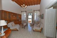 A seating area at Xατζηράδος