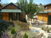 Vonkajšia záhrada v ubytovaní Zeus-Village οικισμός φινλανδικών chalet με πισίνες & γυμναστήριο