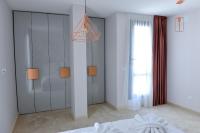 Postel nebo postele na pokoji v ubytování Boutique Apartments Blagoevgrad