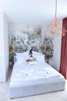 Postel nebo postele na pokoji v ubytování Boutique Apartments Blagoevgrad