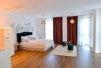 Postel nebo postele na pokoji v ubytování Boutique Apartments Blagoevgrad