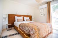 Postel nebo postele na pokoji v ubytování Casa Verde Guesthouse