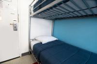 Ein Bett oder Betten in einem Zimmer der Unterkunft West Side YMCA