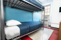 Ein Bett oder Betten in einem Zimmer der Unterkunft West Side YMCA