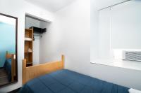 Ein Bett oder Betten in einem Zimmer der Unterkunft West Side YMCA