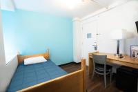 Ein Bett oder Betten in einem Zimmer der Unterkunft West Side YMCA