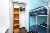 Ein Bett oder Betten in einem Zimmer der Unterkunft West Side YMCA