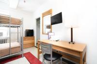 Ein Bett oder Betten in einem Zimmer der Unterkunft West Side YMCA