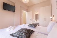 Łóżko lub łóżka w pokoju w obiekcie Relax Studios Corfu