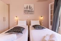 Łóżko lub łóżka w pokoju w obiekcie Relax Studios Corfu