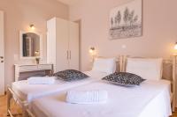 Łóżko lub łóżka w pokoju w obiekcie Relax Studios Corfu