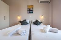 Łóżko lub łóżka w pokoju w obiekcie Relax Studios Corfu